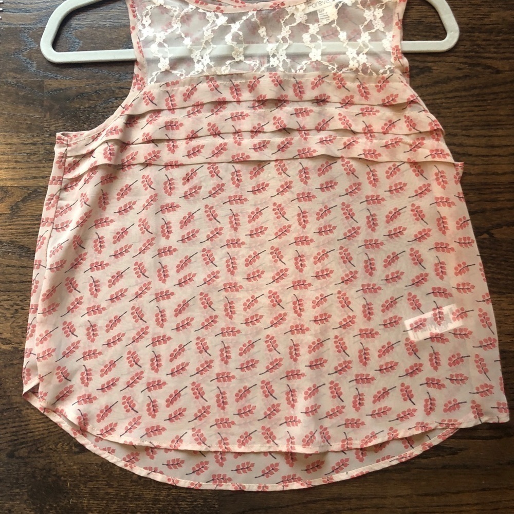 Sheer sleeveless top. - Picture 3 of 4